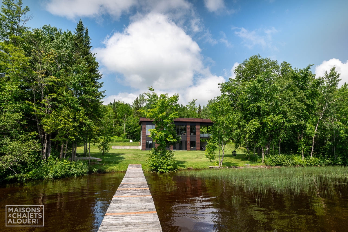 Le Paradis du Lac Aylmer Photos chalet Extérieur Été